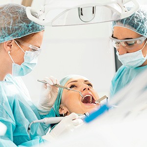 Patient undergoing dental implant surgery