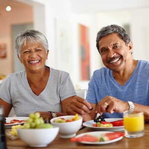 Couple eating healthy foods for dinner