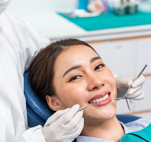 Woman smiling at the dentist