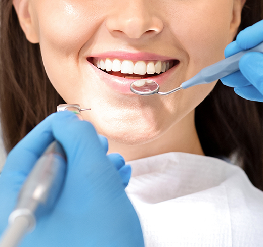 Close up of patient having teeth examined for preventive dentistry in Georgetown