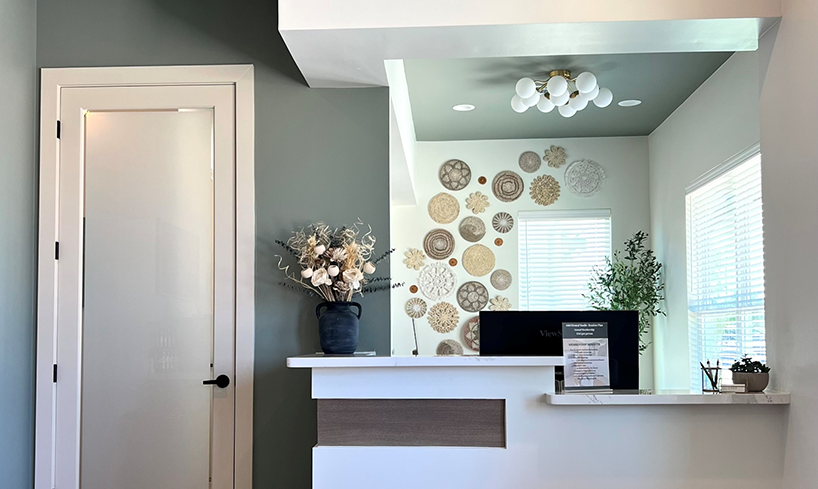 Door and reception area in dental office