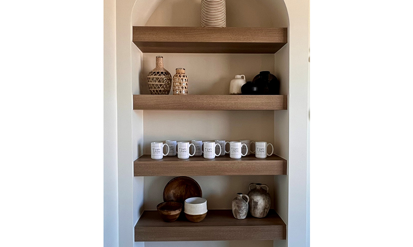 Mugs and assorted other items on shelves