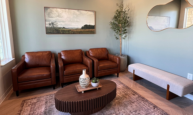 Chairs and small table in dental office waiting room