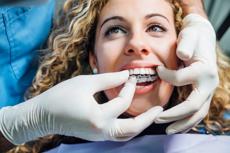 female patient wearing Invisalign